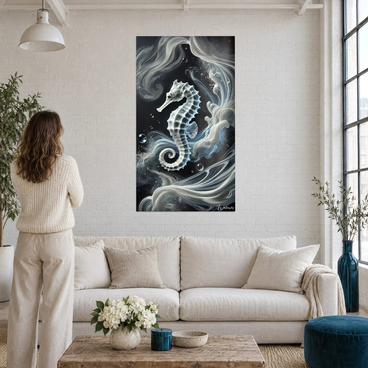 Wall art translucent seahorse surrounded by white and bluish wisps of smoke on a black background, above a sofa in a bright living room