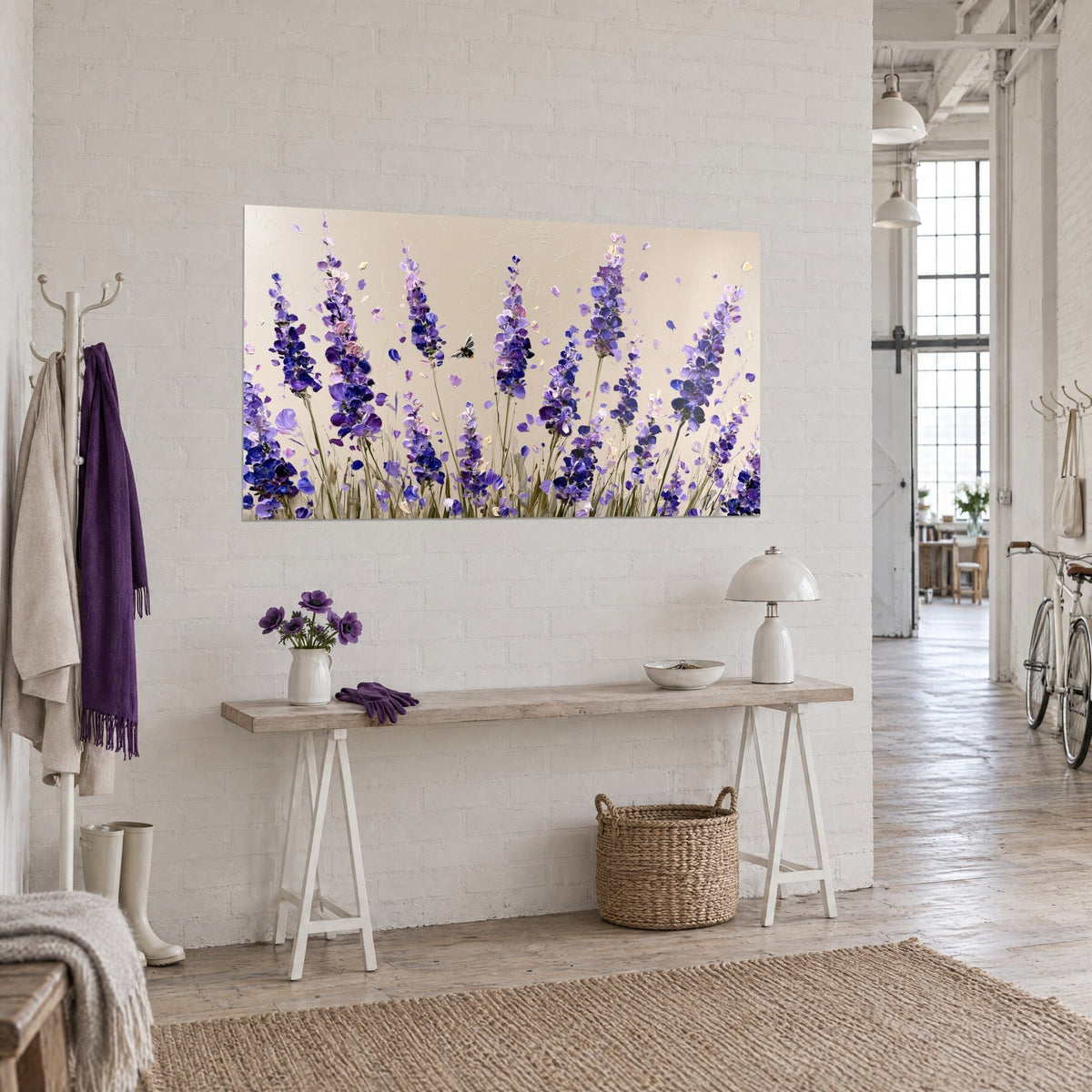 Wall art bee foraging among purple and lilac stems, textured sand background, hung above a light wood console