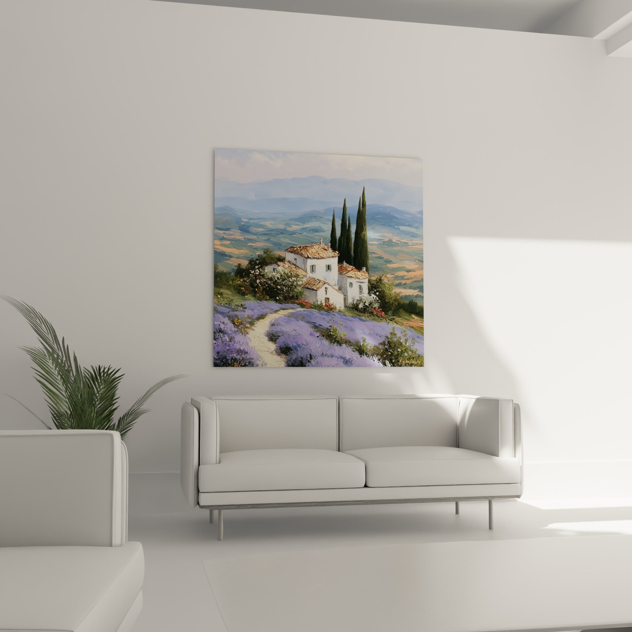 Cyprès sombres et collines bleutées entourant une bâtisse blanche au-dessus d'un canapé dans un salon lumineux
