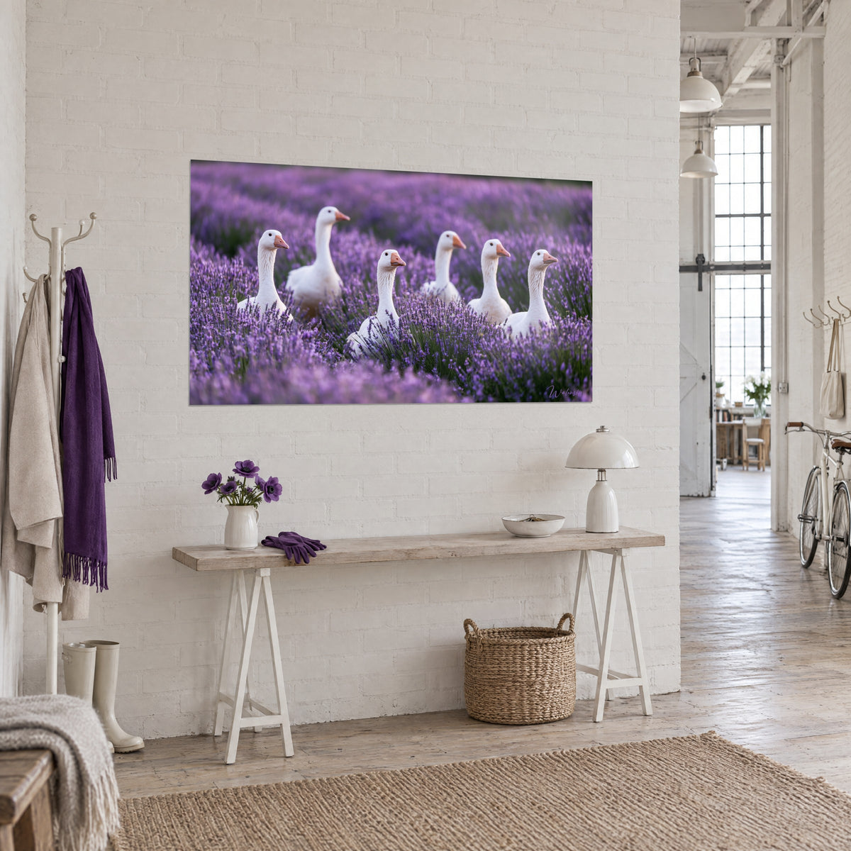 Wall art six ivory waterfowl with necks held high among lilac and green lavender spikes, hung on a white brick wall