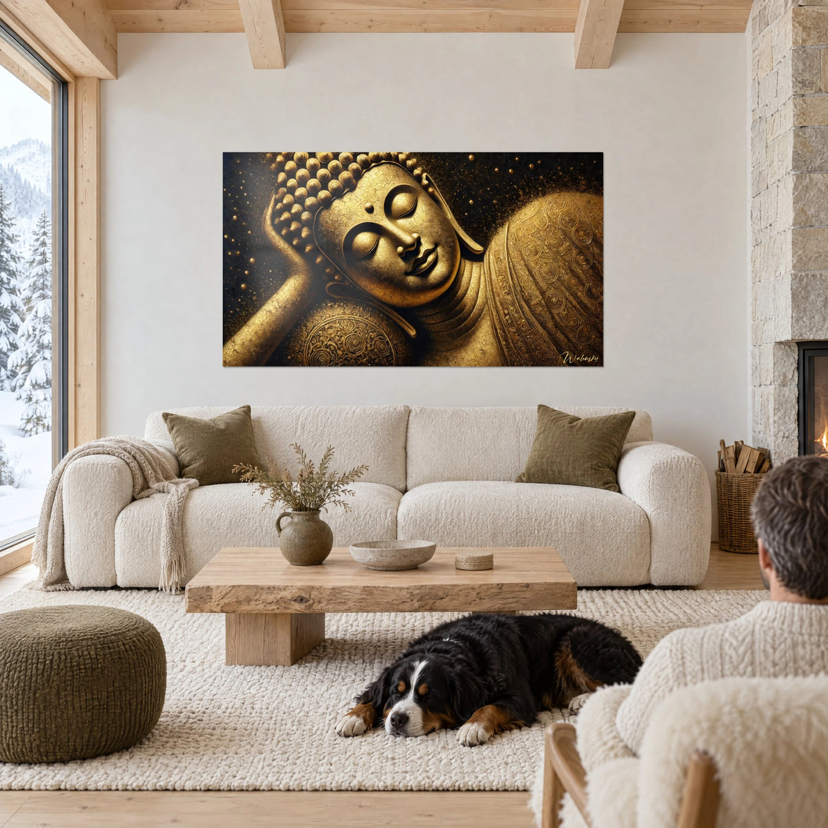 Tableau Bouddha couché doré à la joue posée sur la main, fond noir, chien noir et blanc, au-dessus d'un canapé dans un salon lumineux