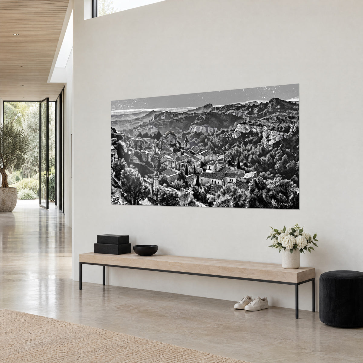 Falaises calcaires et maisons blanches du village provençal au-dessus d'un canapé dans un salon lumineux