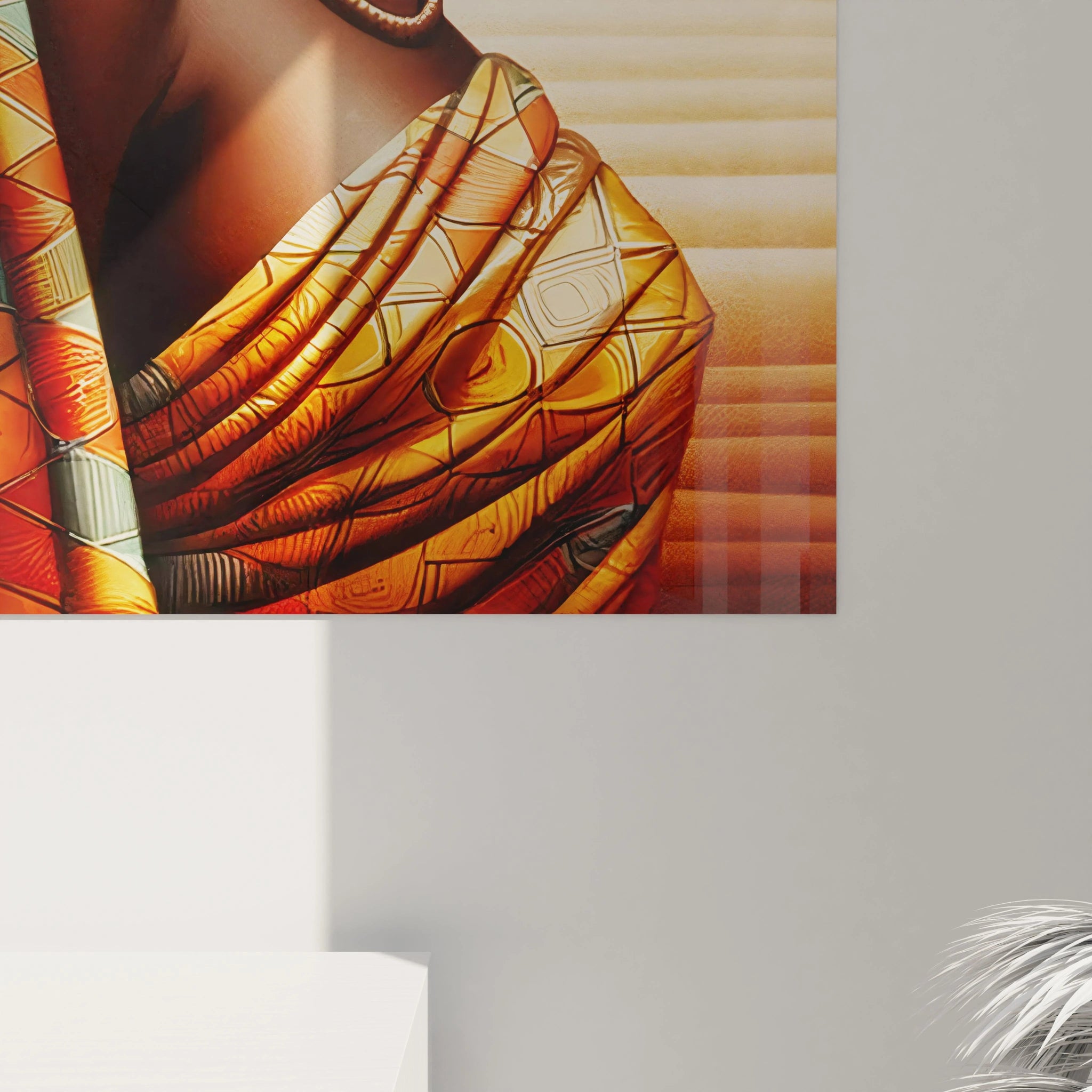 Détail du tableau africain montrant la texture du panier et les motifs du tissu. Les nuances de marron et orange sont accentuées, illustrant la beauté du design traditionnel.

