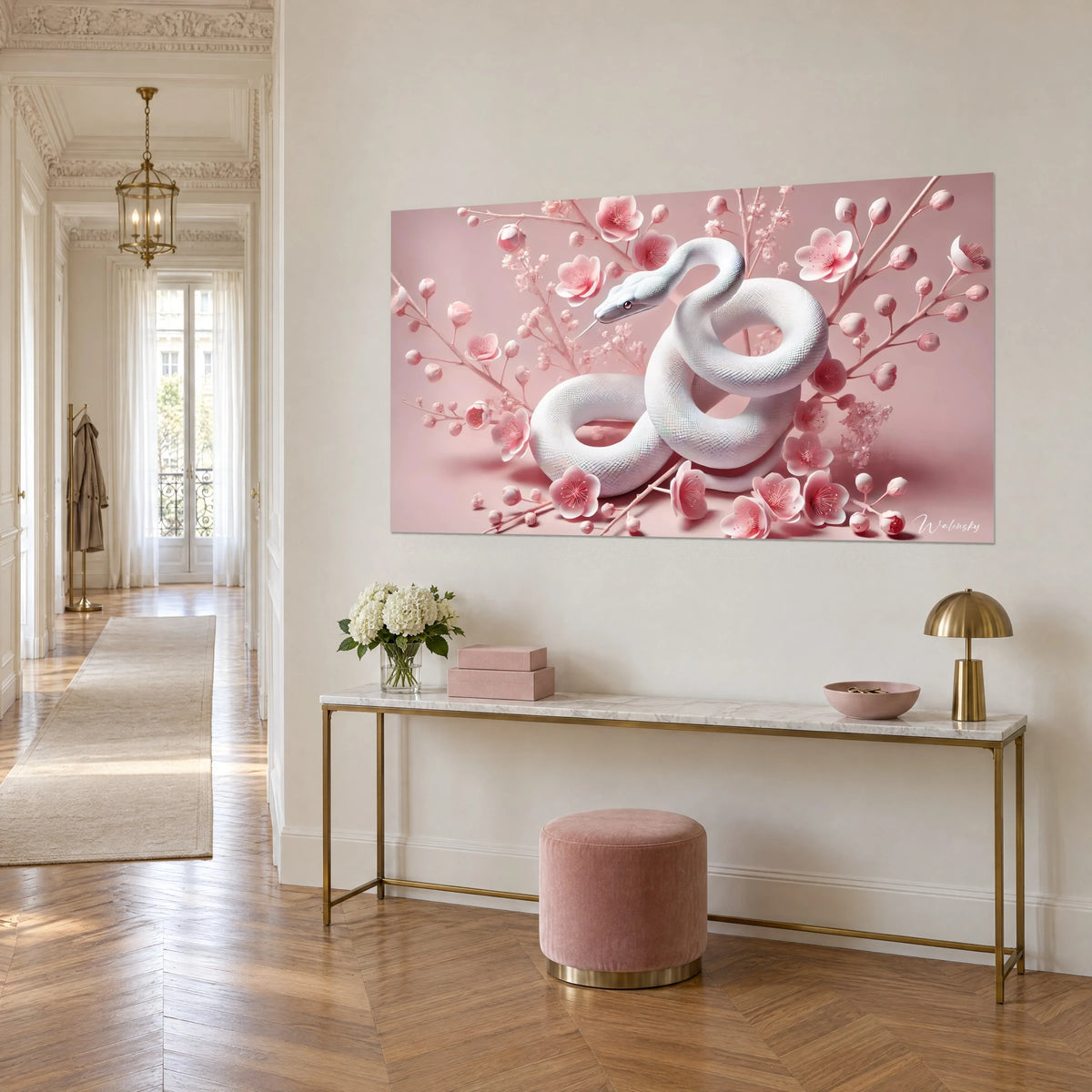 Tableau serpent d'ivoire enroulé en spirales, branches de cerisier rose pâle et boutons sculptés, sur une console dorée en entrée haussmannienne