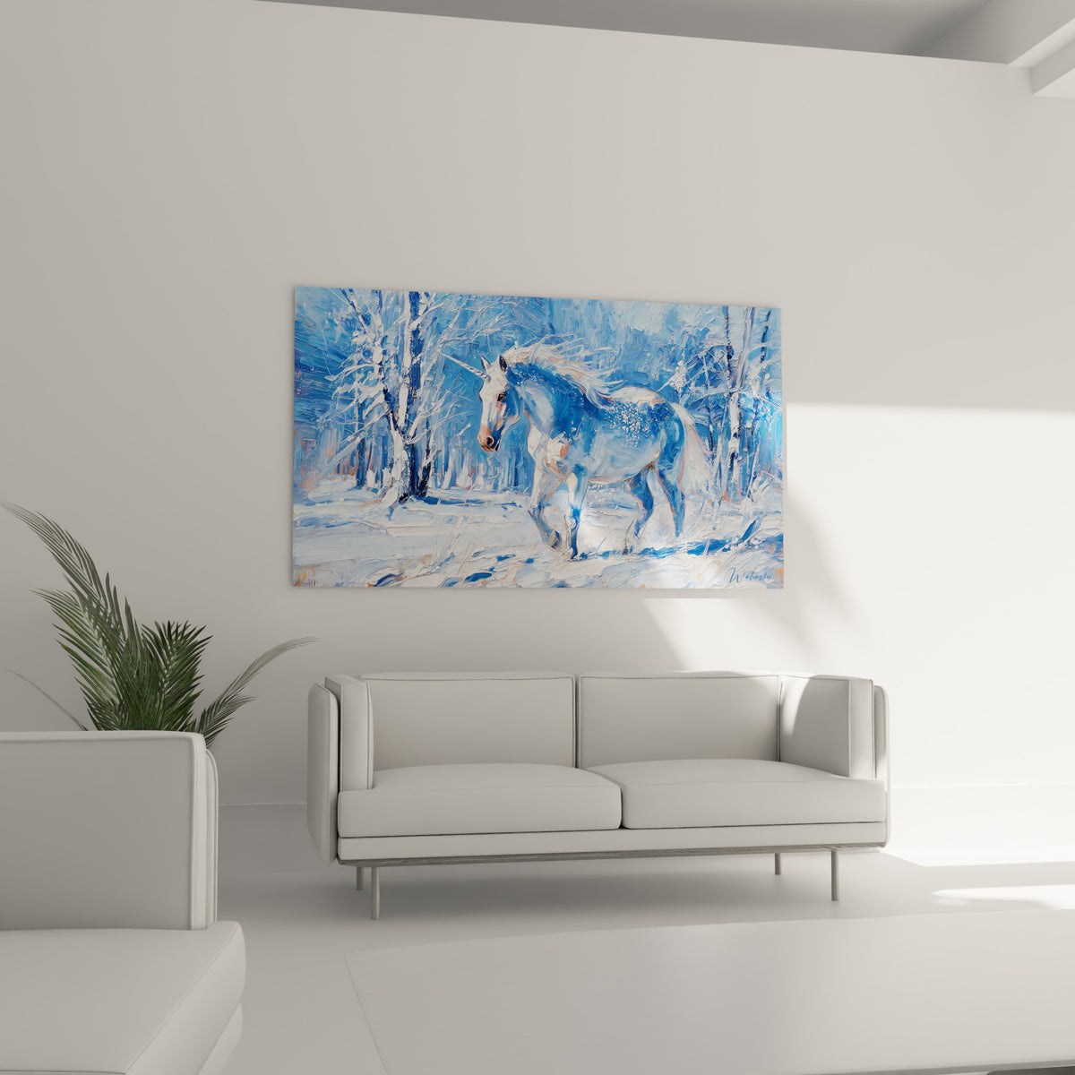 Silhouette bleu marine et ocre d'une licorne dans un sous-bois blanc, au-dessus d'un canapé dans un salon lumineux