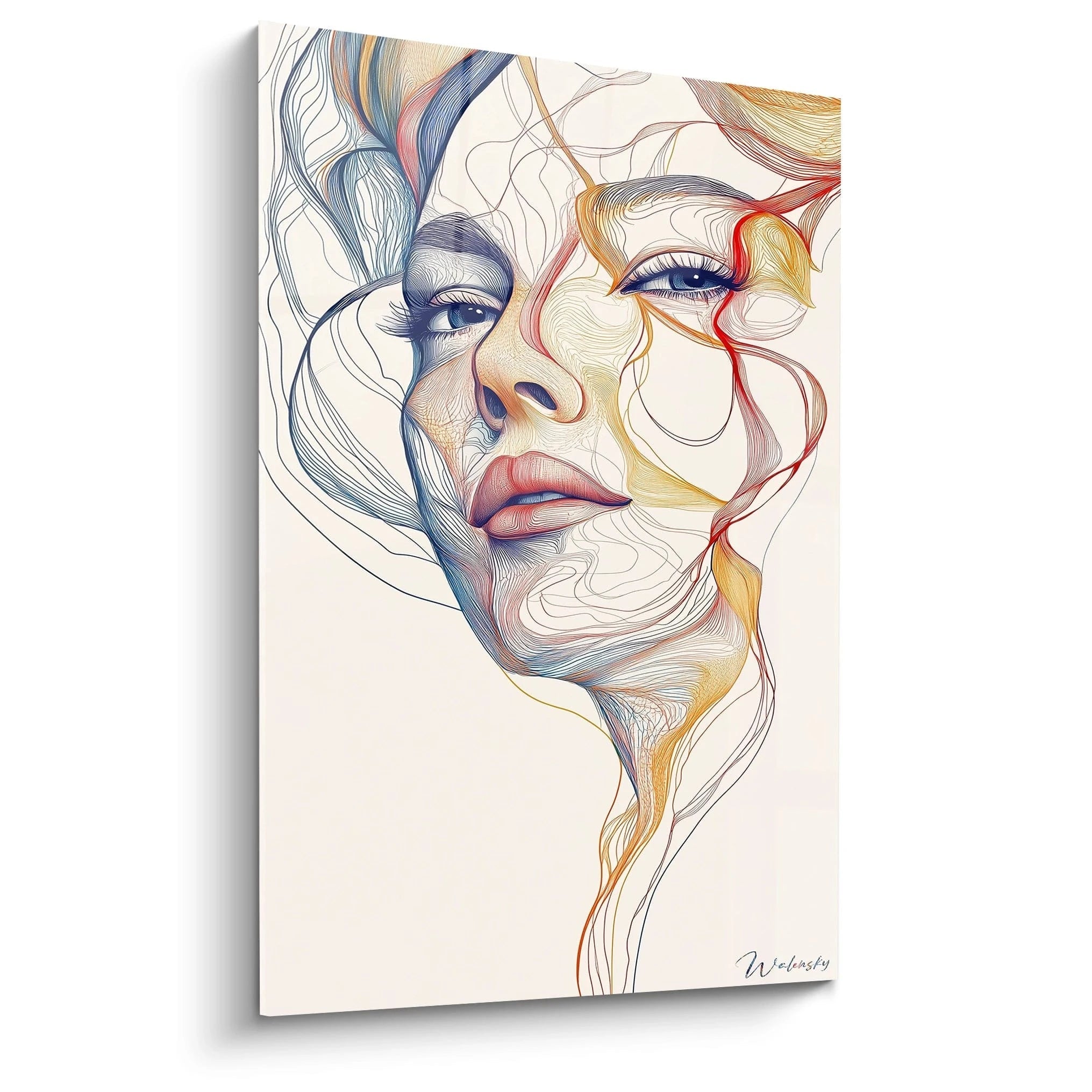 Un tableau visage abstrait composé de lignes fluides colorées formant un portrait féminin délicat. Des traits bleus, oranges et rouges s'entrelacent sur fond beige pour créer des contours expressifs avec des yeux profonds et des lèvres définies.
