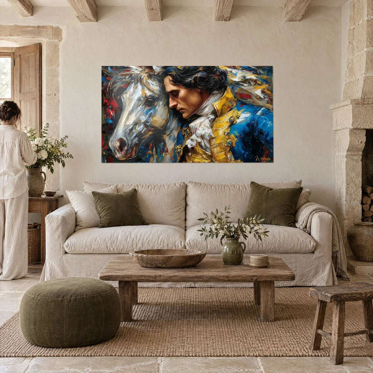 Tableau cavalier à veste bleue et col doré, front contre un cheval blanc, au-dessus d'un canapé dans un salon lumineux