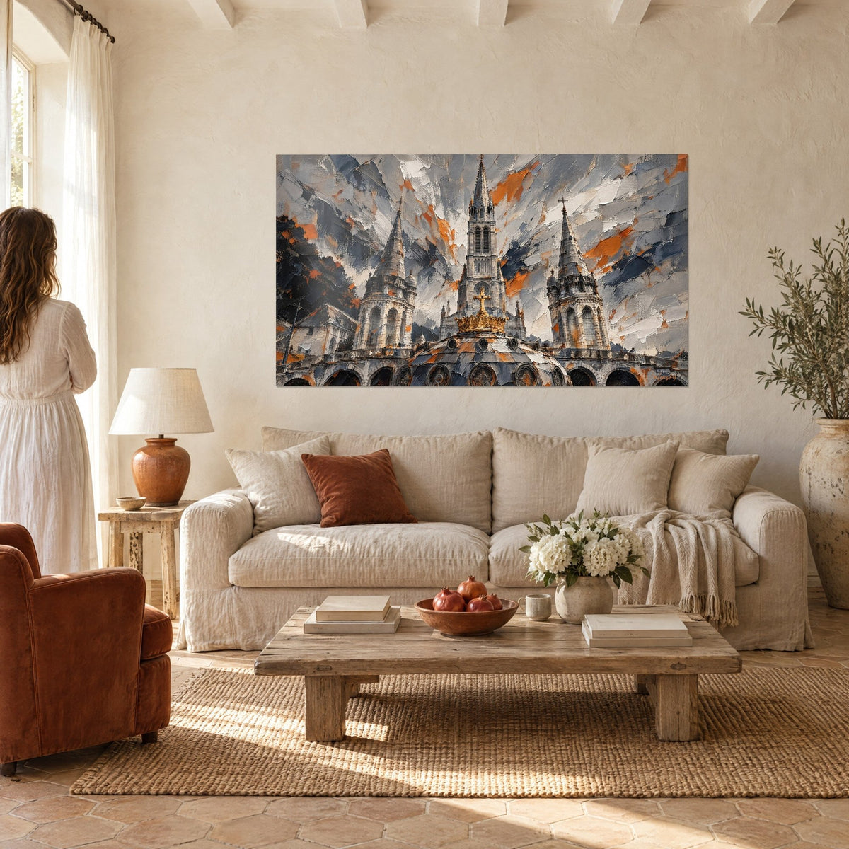 Wall art stone basilica with three spires, grey and orange sky, golden crown, above a sofa in a bright living room