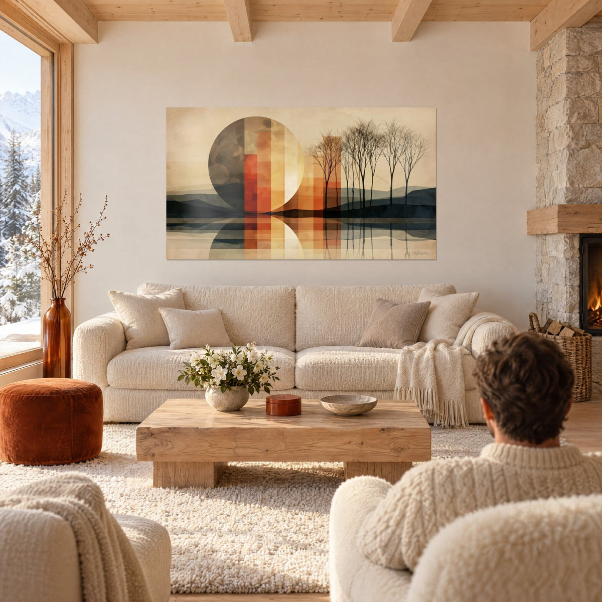 Tableau disque lunaire ocre et bandes terracotta sur lac gris, arbres nus à droite, au-dessus d'un canapé dans un salon lumineux
