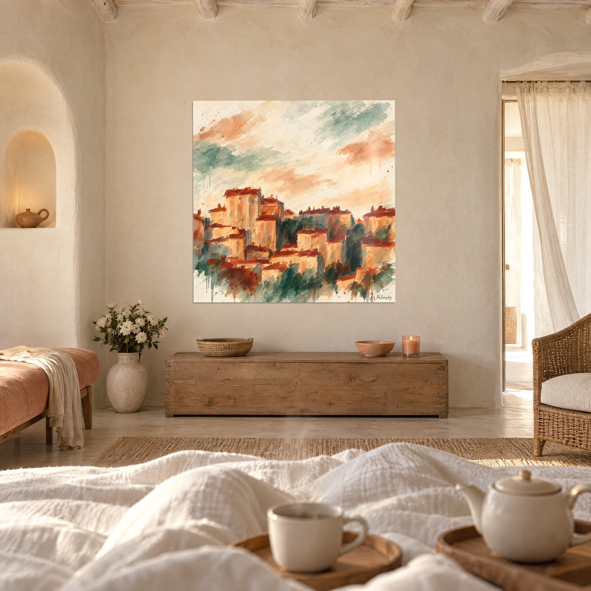 Quadro città medievale dai tetti in terracotta e fogliame verde salvia, sopra un letto in una camera luminosa