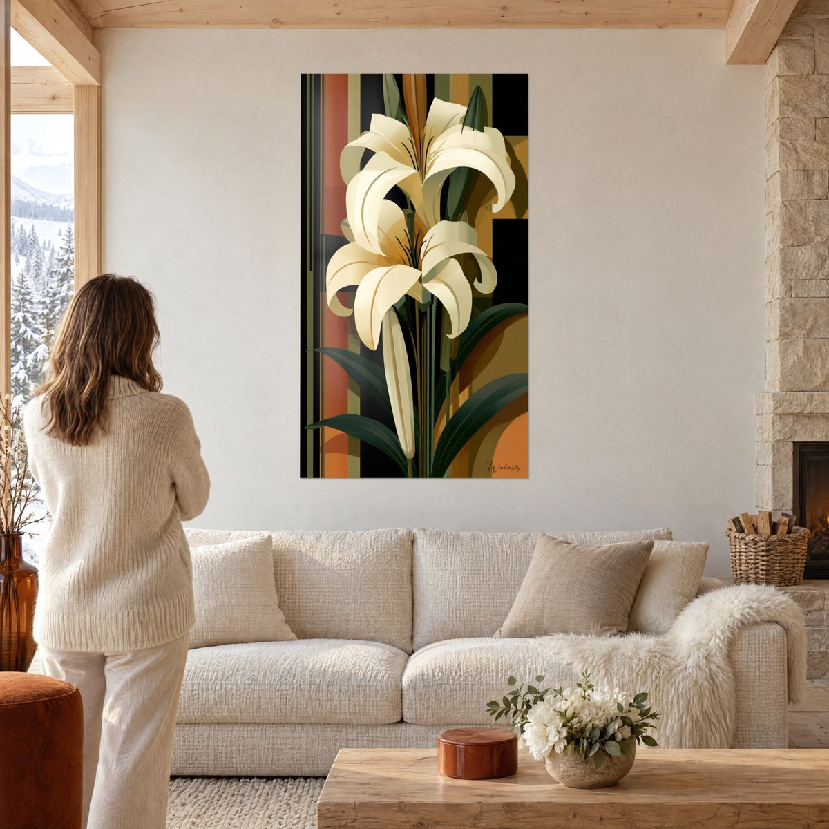 Tableau lys crème aux pétales recourbés sur bandes rouille et vert sauge, au-dessus d'un canapé dans un salon lumineux