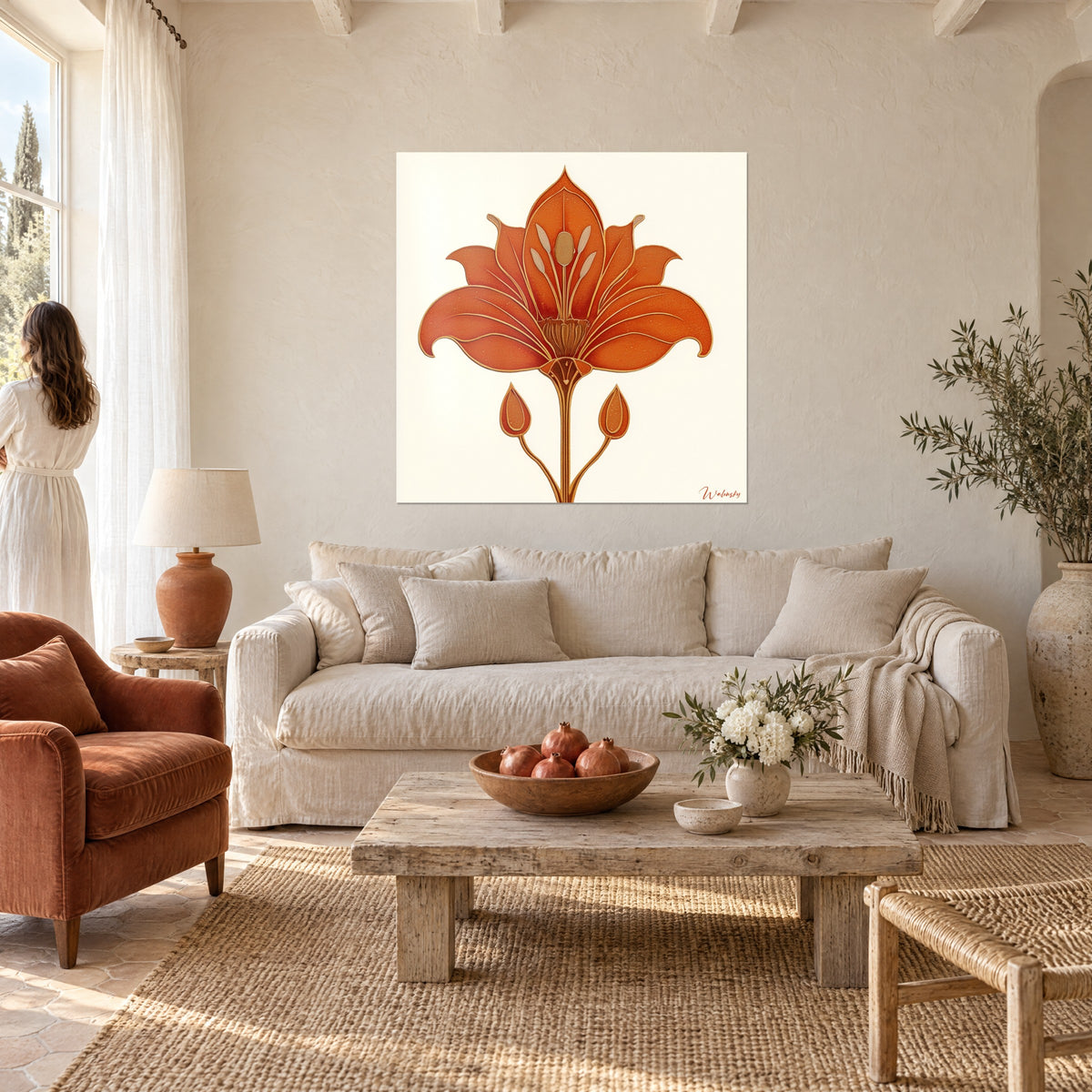 Tableau lys ouvert orange terracotta aux liserés dorés, symétrique, sur fond crème, au-dessus d'un canapé dans un salon lumineux