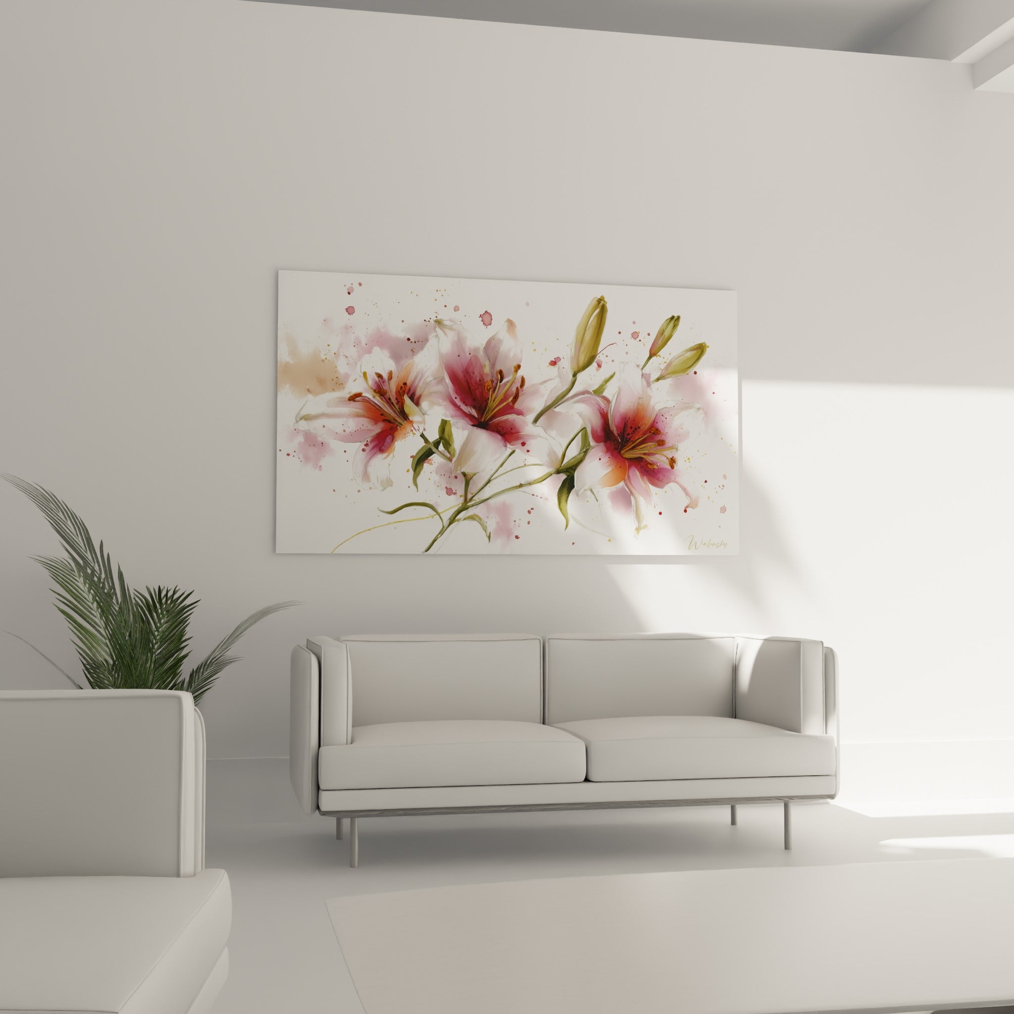 Fleurs de lys blanches et roses aux étamines dorées accrochées au-dessus d'un canapé dans un salon lumineux