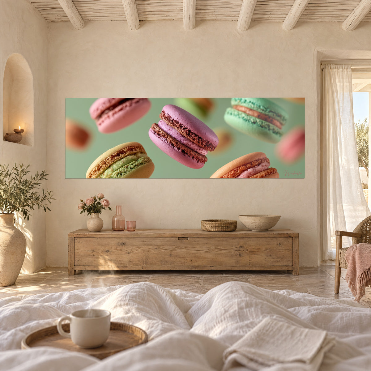Wall art swirling indulgent cookies, pink cream and almond green on sage, above a bed in a light bedroom