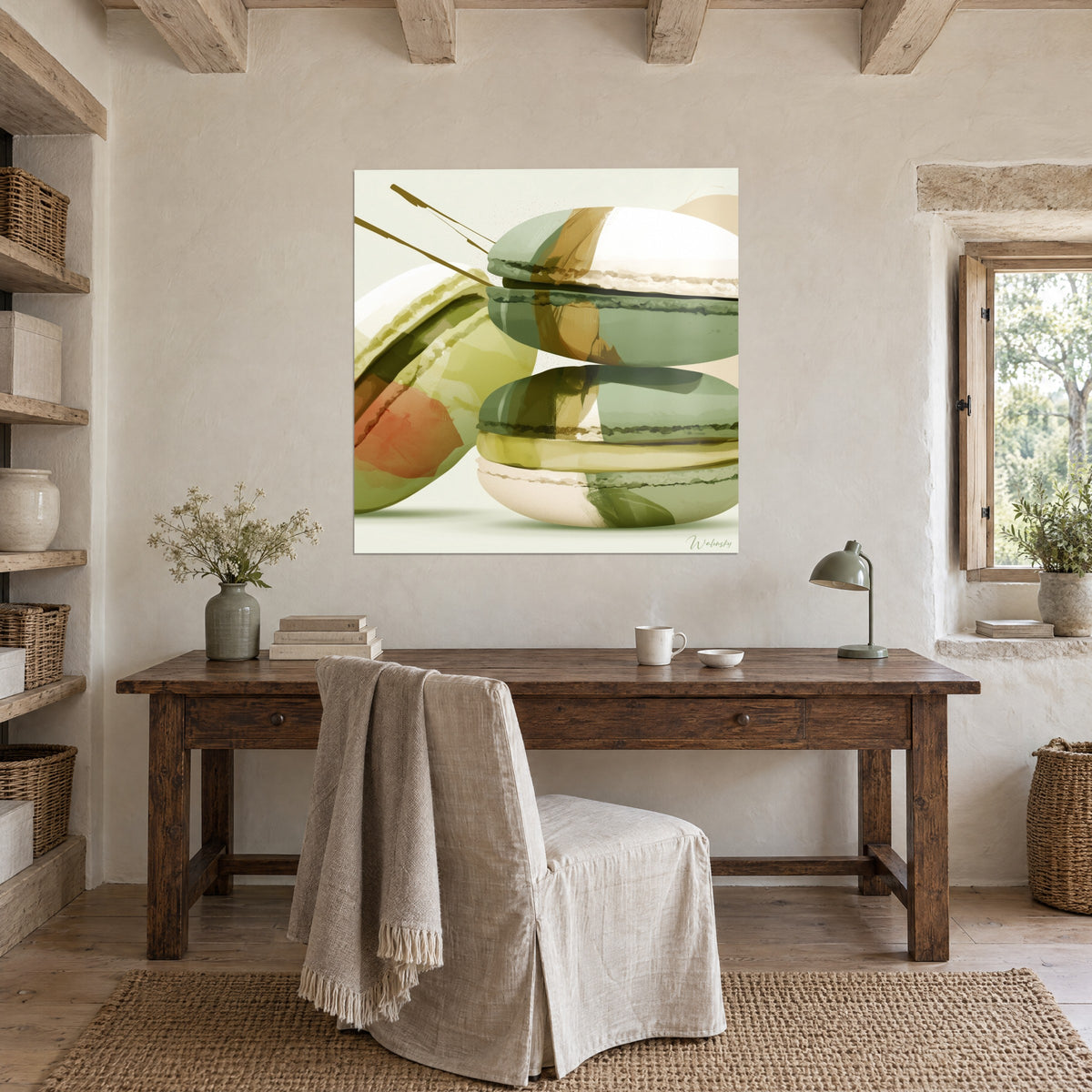 Quadro macarons nelle sfumature salvia, crema e ocra, sottili tratti bruni, sopra una scrivania in legno grezzo vicino alla finestra