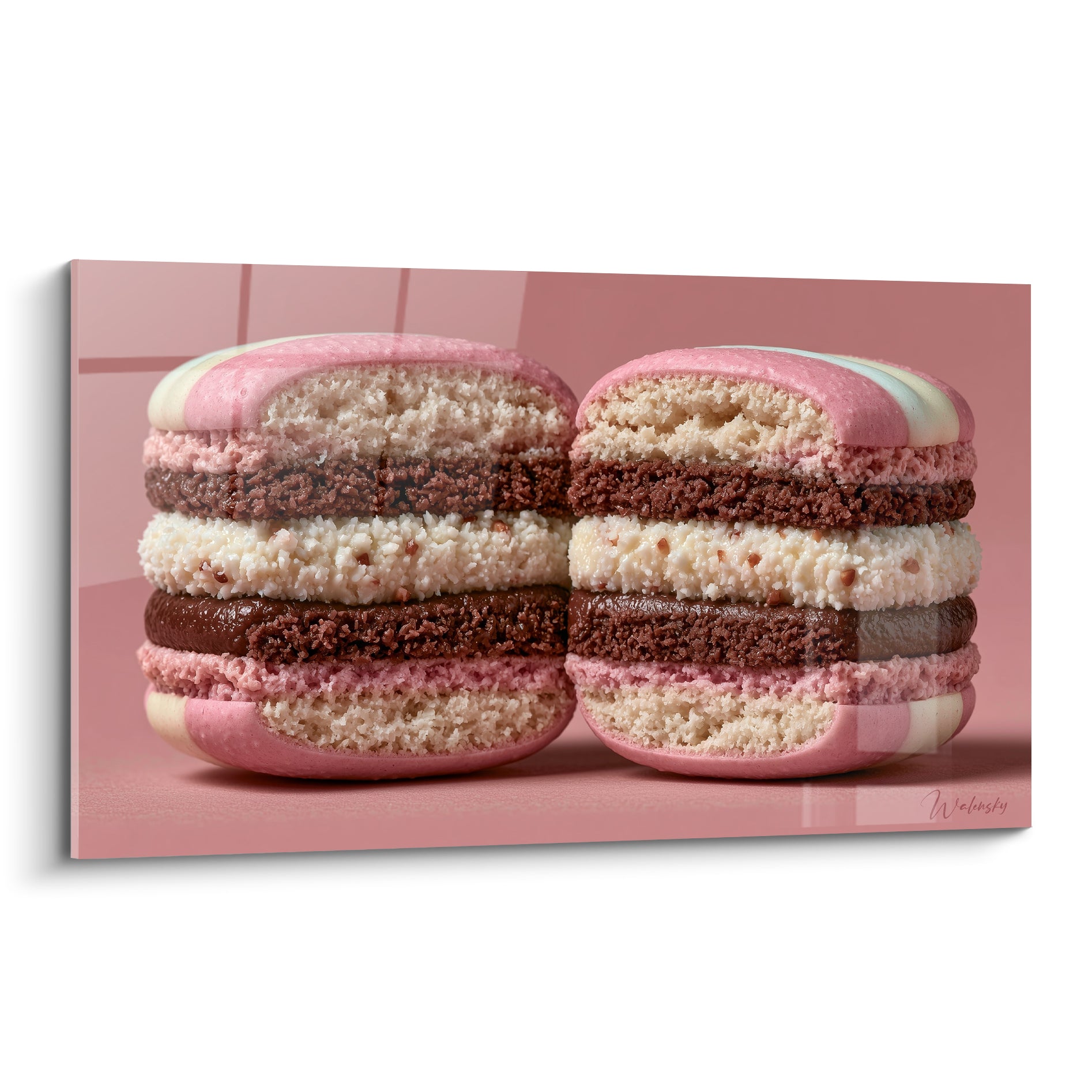 Macarons roses coupés en deux exposant leurs couches chocolat et crème sur fond terracotta glossy