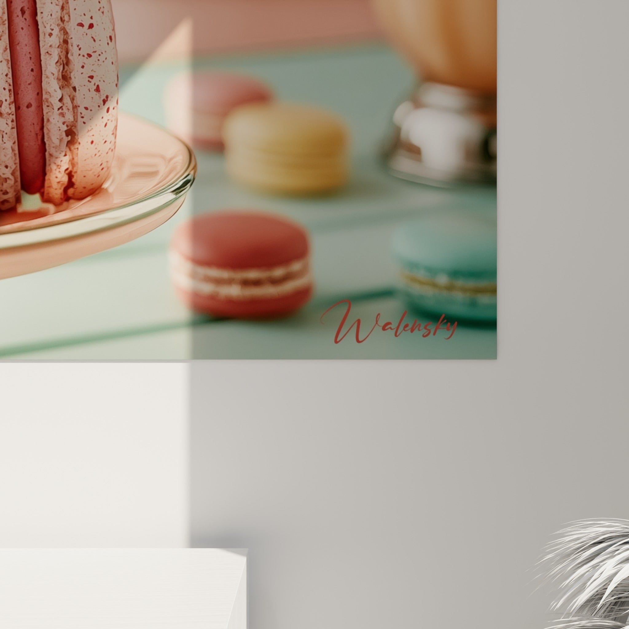 Grain de l'impression révélant le glaçage rose et les billes colorées des macarons empilés