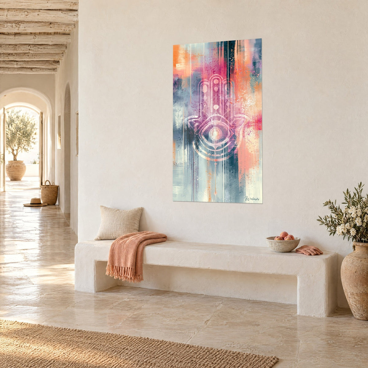 Wall art with a hamsa amulet, glowing eye at the centre, coral and blue-grey splashes, above a white bench in a vaulted hallway