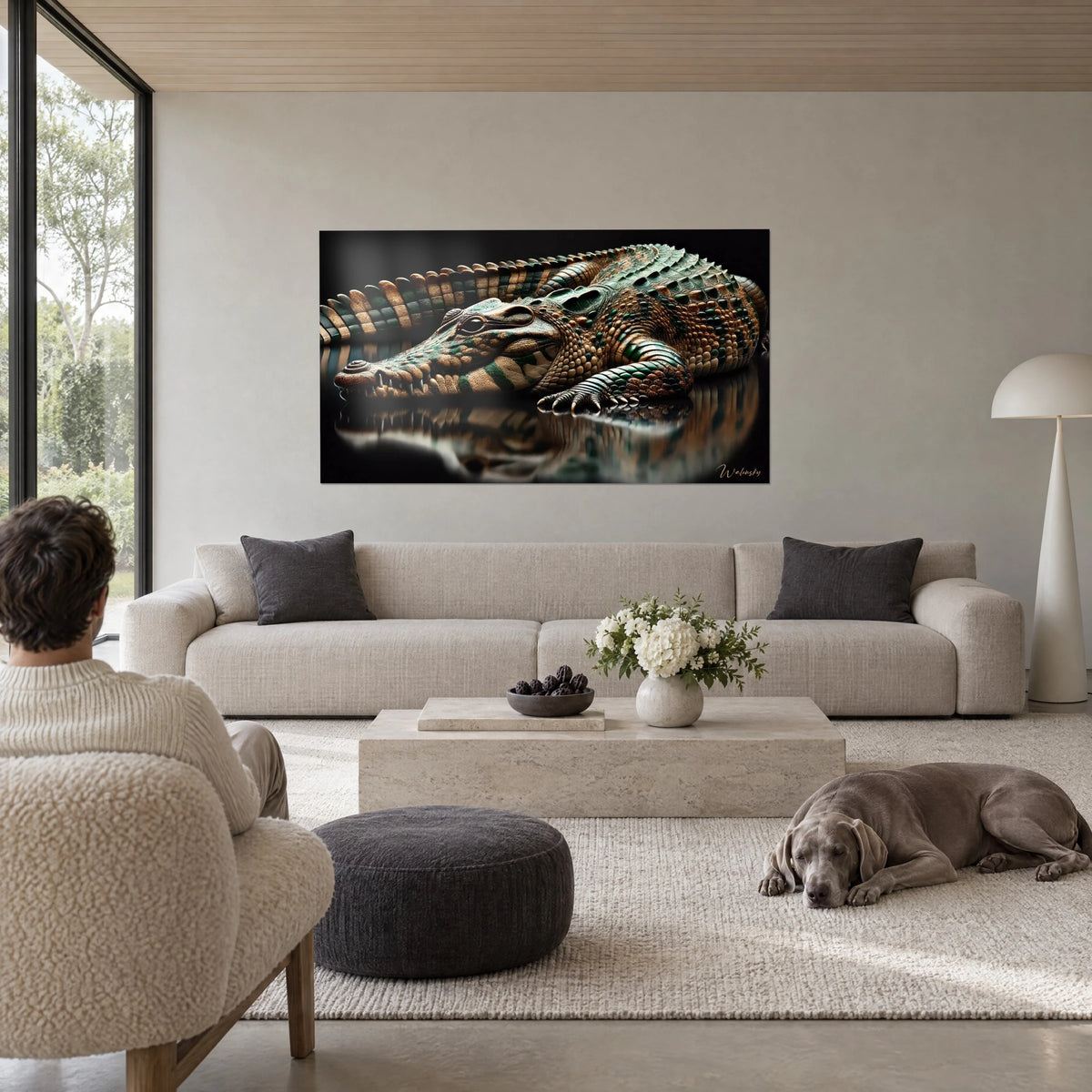 Wall art crocodile with emerald and copper scales, reflected in a black mirror, above a sofa in a bright living room