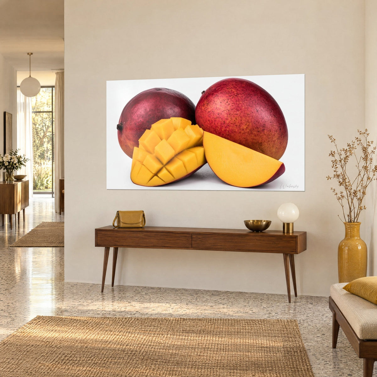 Wall art tropical fruit in scarlet red with a speckled skin, saffron flesh cubes and an amber wedge, above a wooden console