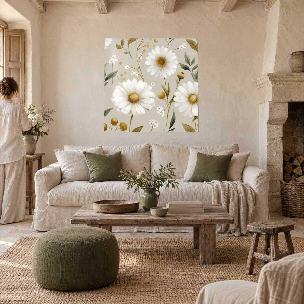 Quadro grandi margherite bianche con cuore dorato su fondo grigio greige, foglie verde salvia, sopra un divano in un soggiorno luminoso