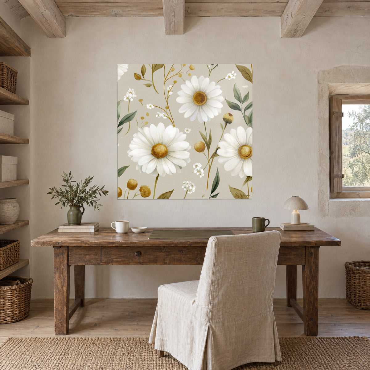 Quadro floreale ad acquerello di margherite bianche e oro su fondo greige, foglie cachi, alla parete di uno studio in pietra