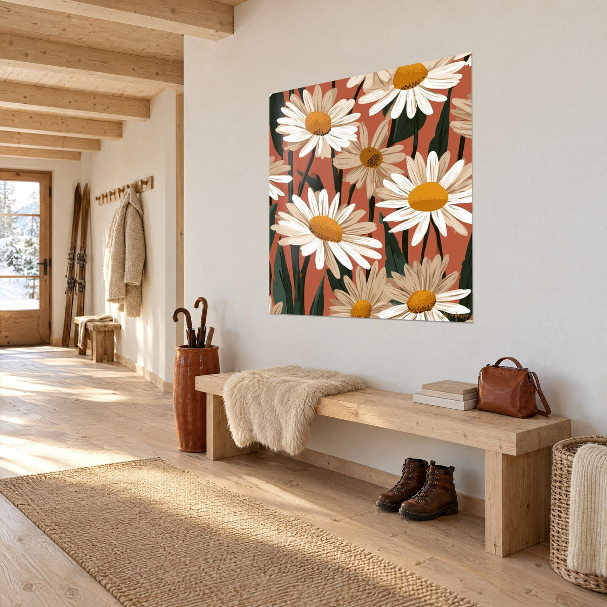 Tableau bouquet de fleurs à pétales crème, centres moutarde et tiges sombres sur terracotta, mur blanc d'une entrée en chalet