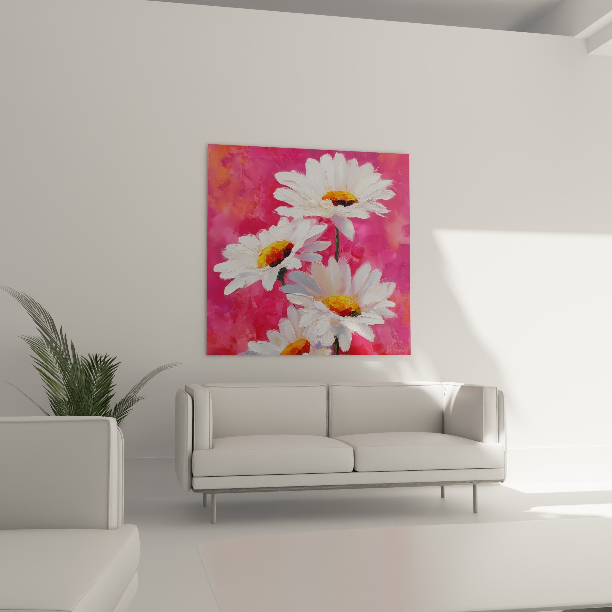 Fleurs de marguerites blanches sur fond rose vif au-dessus d'un canapé dans un salon lumineux