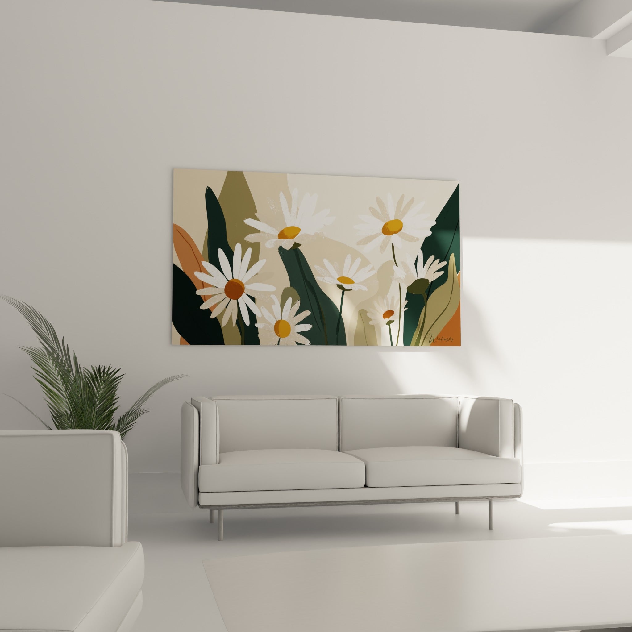 Fleurs de marguerite blanches et terracotta accrochées au-dessus d'un canapé dans un salon lumineux