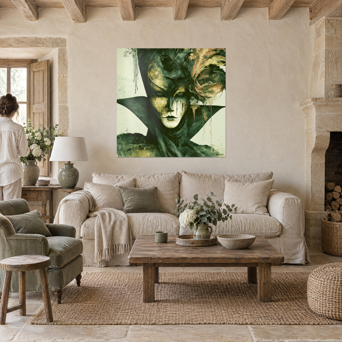 Wall art Venetian mask in green and gold, ochre feathers, gaze beneath the hood, above a sofa in a bright living room