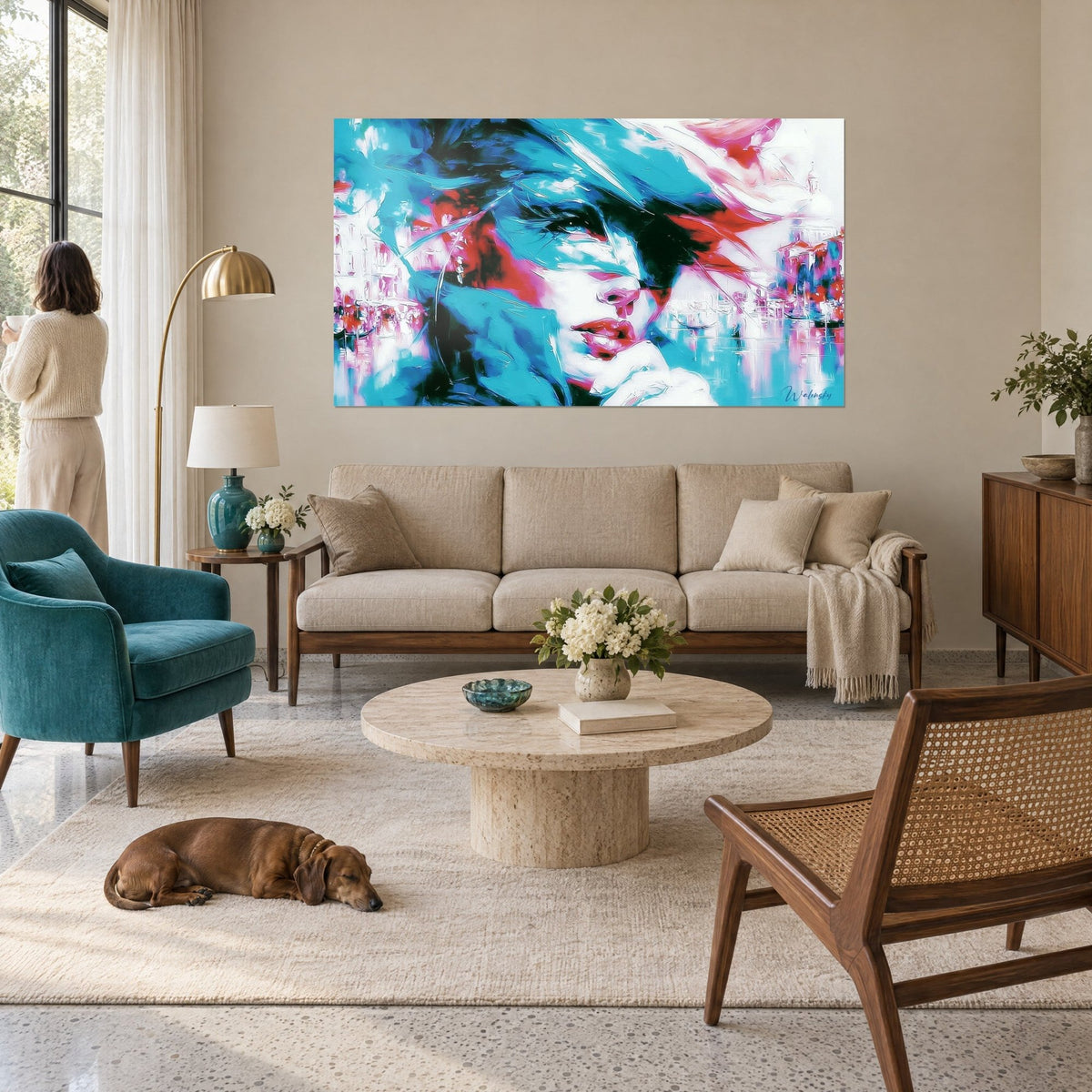 Wall art female portrait with turquoise and coral features, blue hat, red lips, on a beige sofa, bright living room