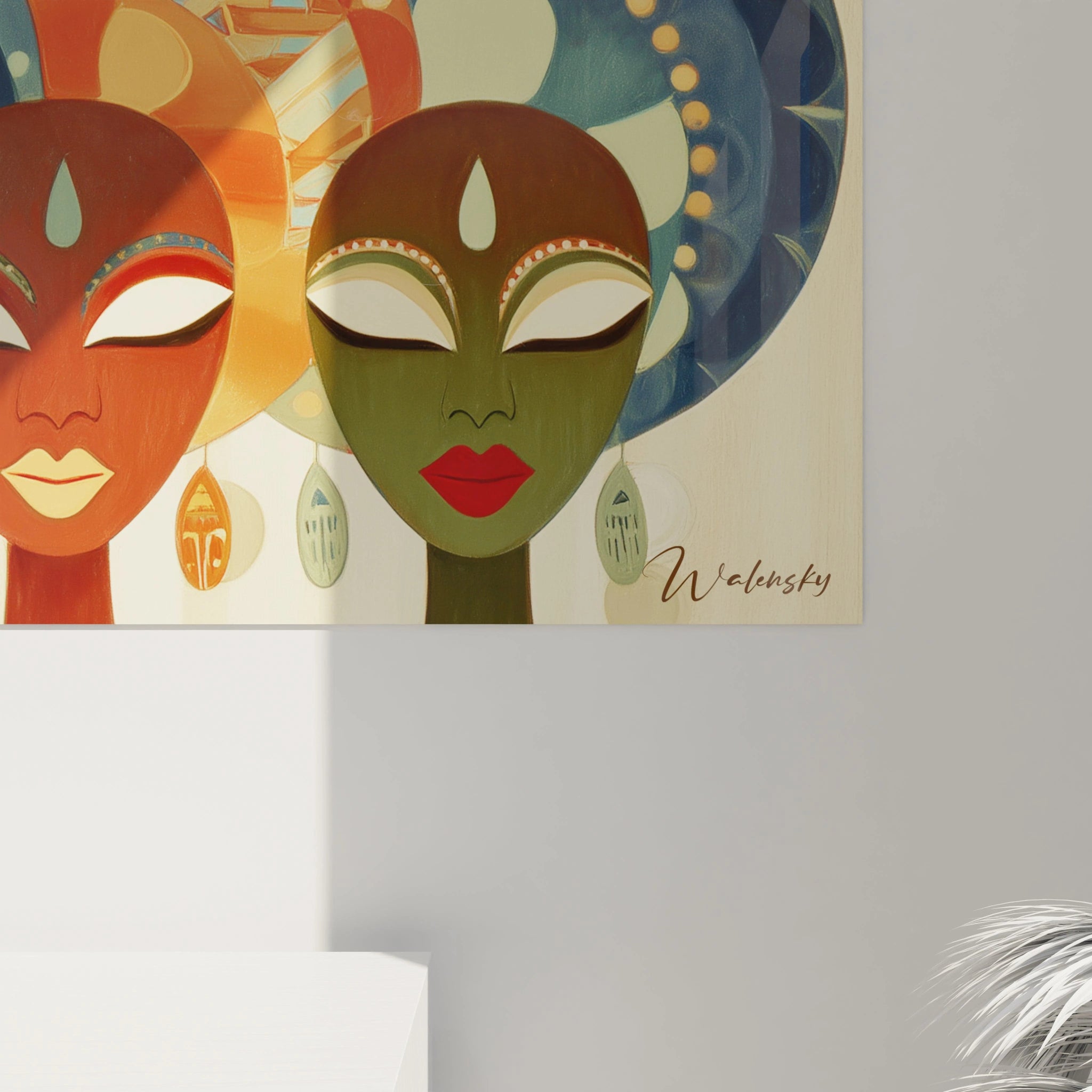 tableau masque africain mural Walensky montrant deux masques stylises verts et rouges, boucles et motifs decoratifs