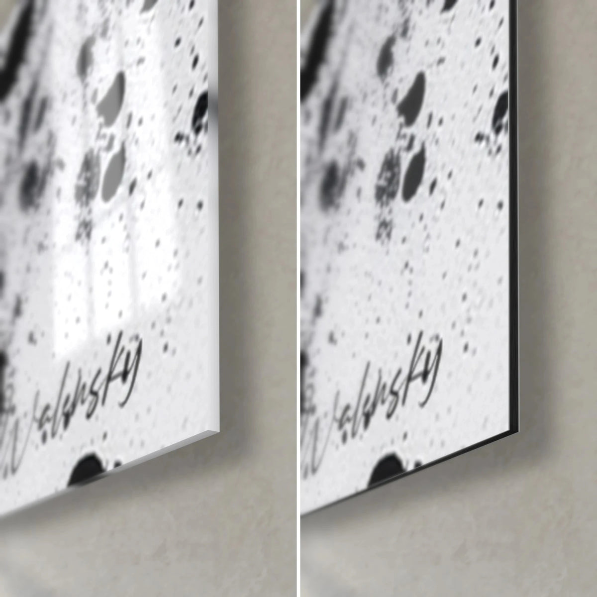 Wall art of a rain of black ink drops on white, bottom right corner, glossy acrylic glass on the left, matte Dibond on the right, 3 mm edge