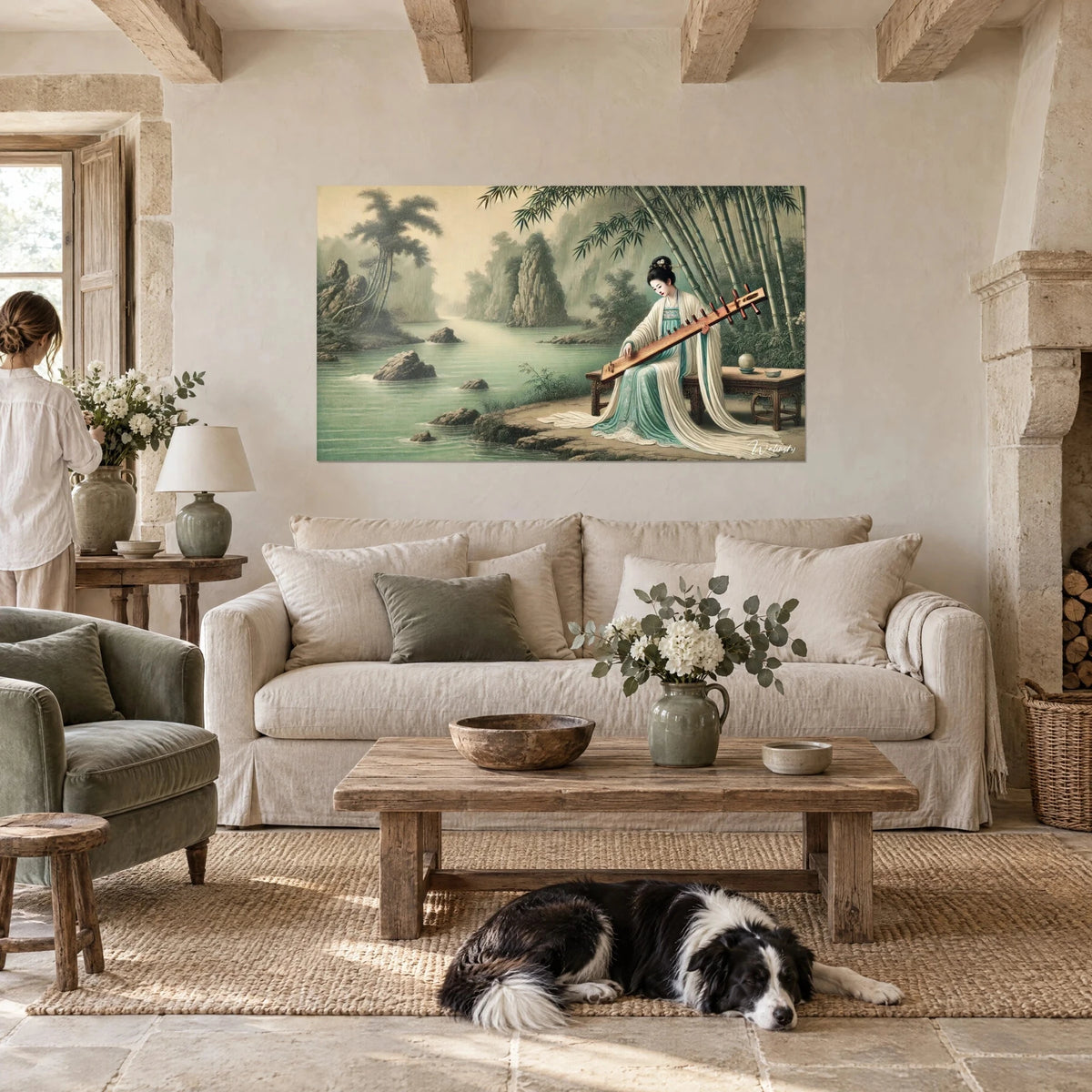 Wall art of a zither player in a jade and ivory dress by a riverbank, green bamboo, above a sofa in a bright living room