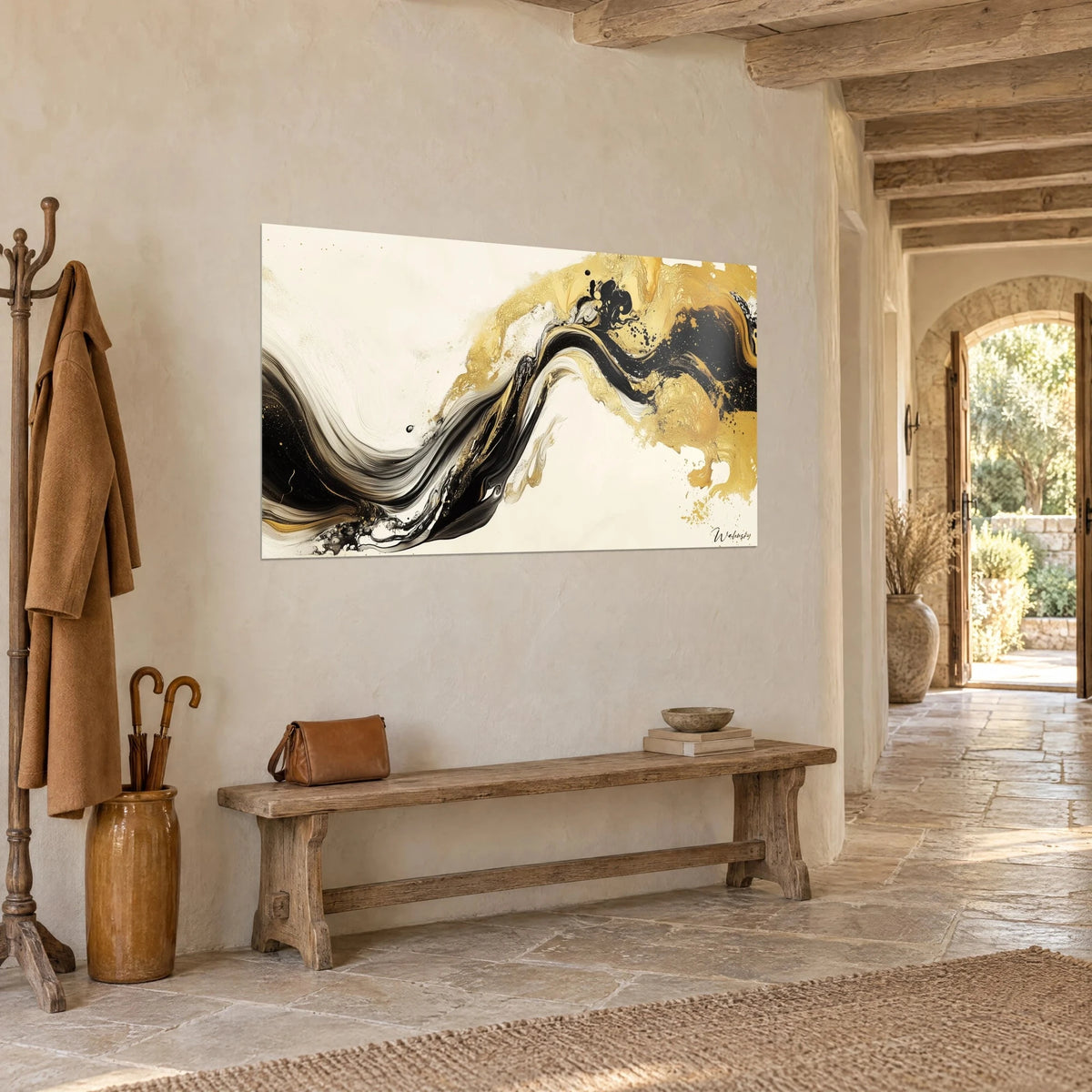 Wall art ebony ink wave with gold splashes on ivory background, hung in an entrance with stone walls and light wooden beams