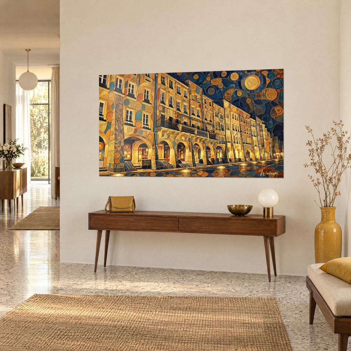 Wall art old buildings in golden mosaic, indigo and ochre spiral sky, hung above a wooden console, three-quarter view