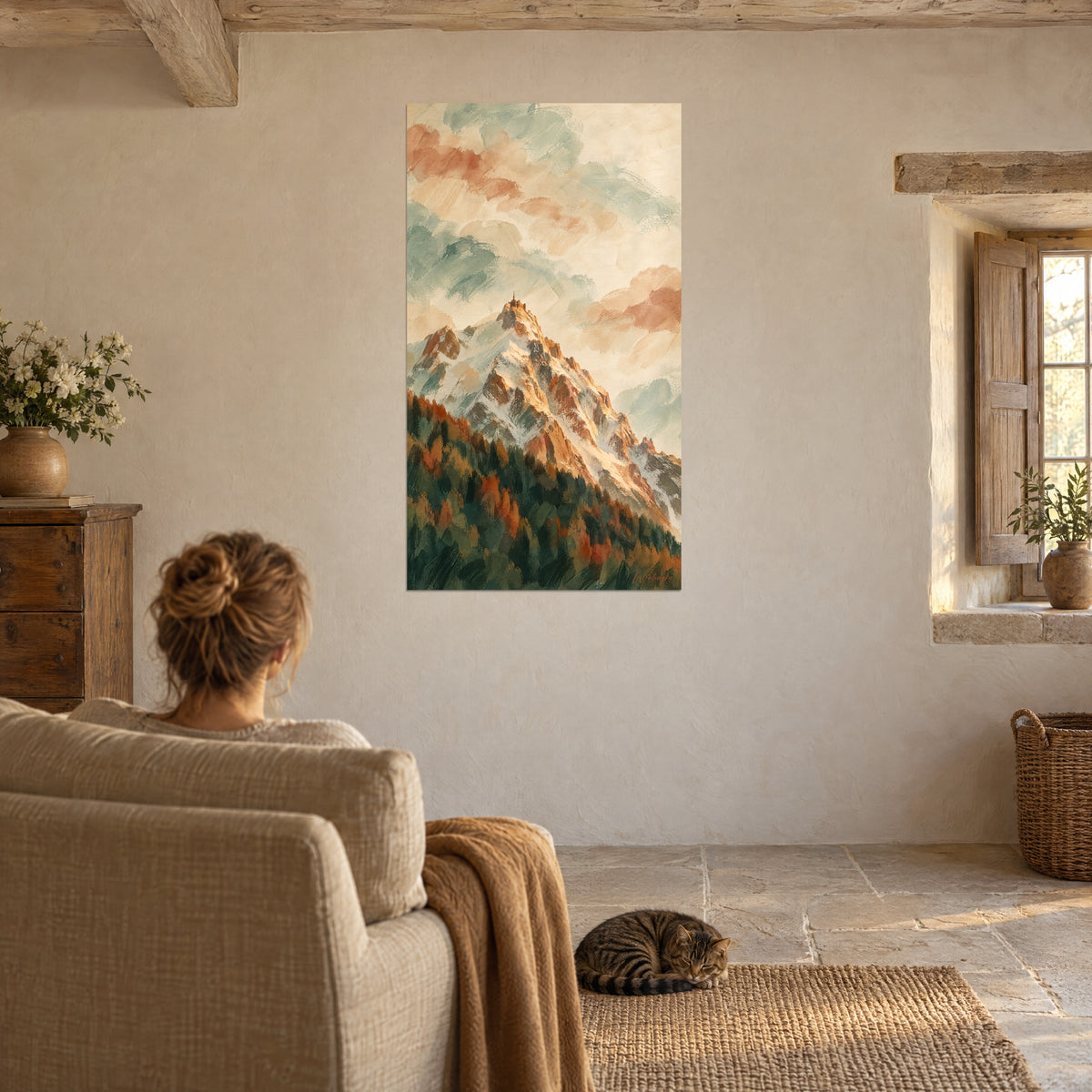 Wall art snowy ridge gilded by the sun, dark green fir trees and russet foliage, on the wall of a stone living room beside an armchair