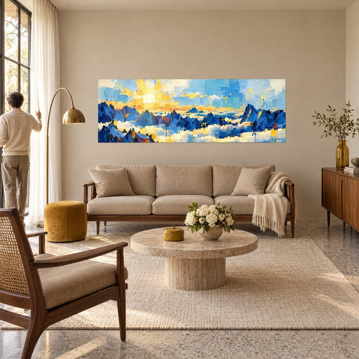 Wall art alpine ridges in cobalt blue under a butter-yellow sun, paint drips, above a sofa in a bright living room