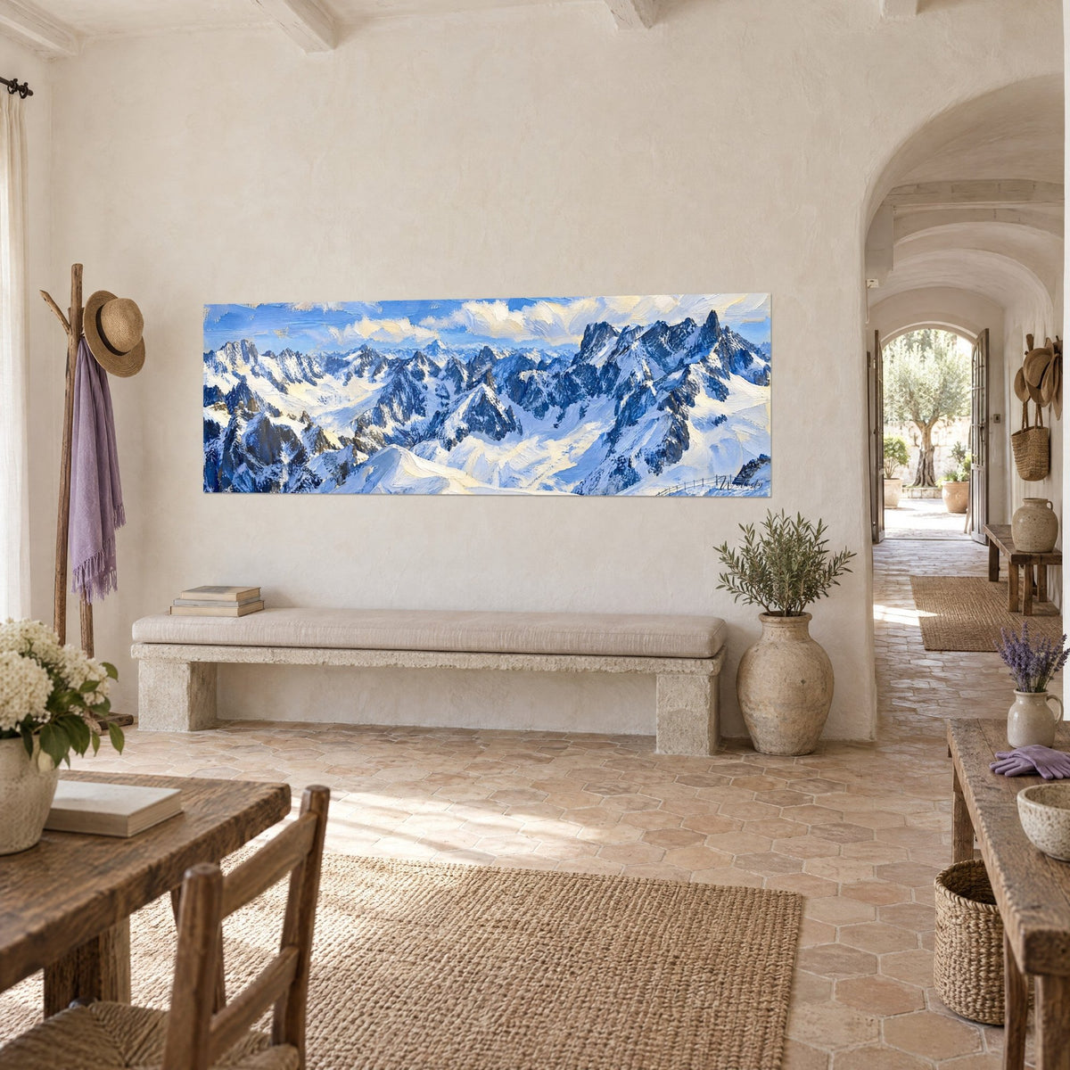 Wall art of a panorama of glaciers and rocky peaks, blue sky and ivory clouds, three-quarter view in a Provençal farmhouse