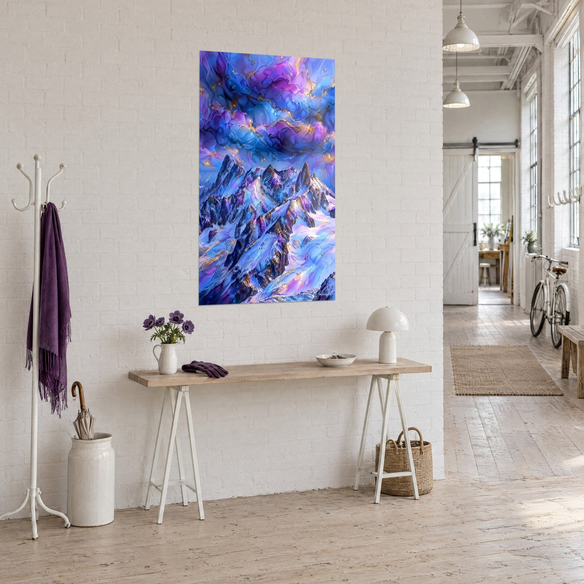 Wall art with snow-capped peaks in sharp points, cobalt blue ice and amber glows under a crimson sky, entrance of an artist's loft
