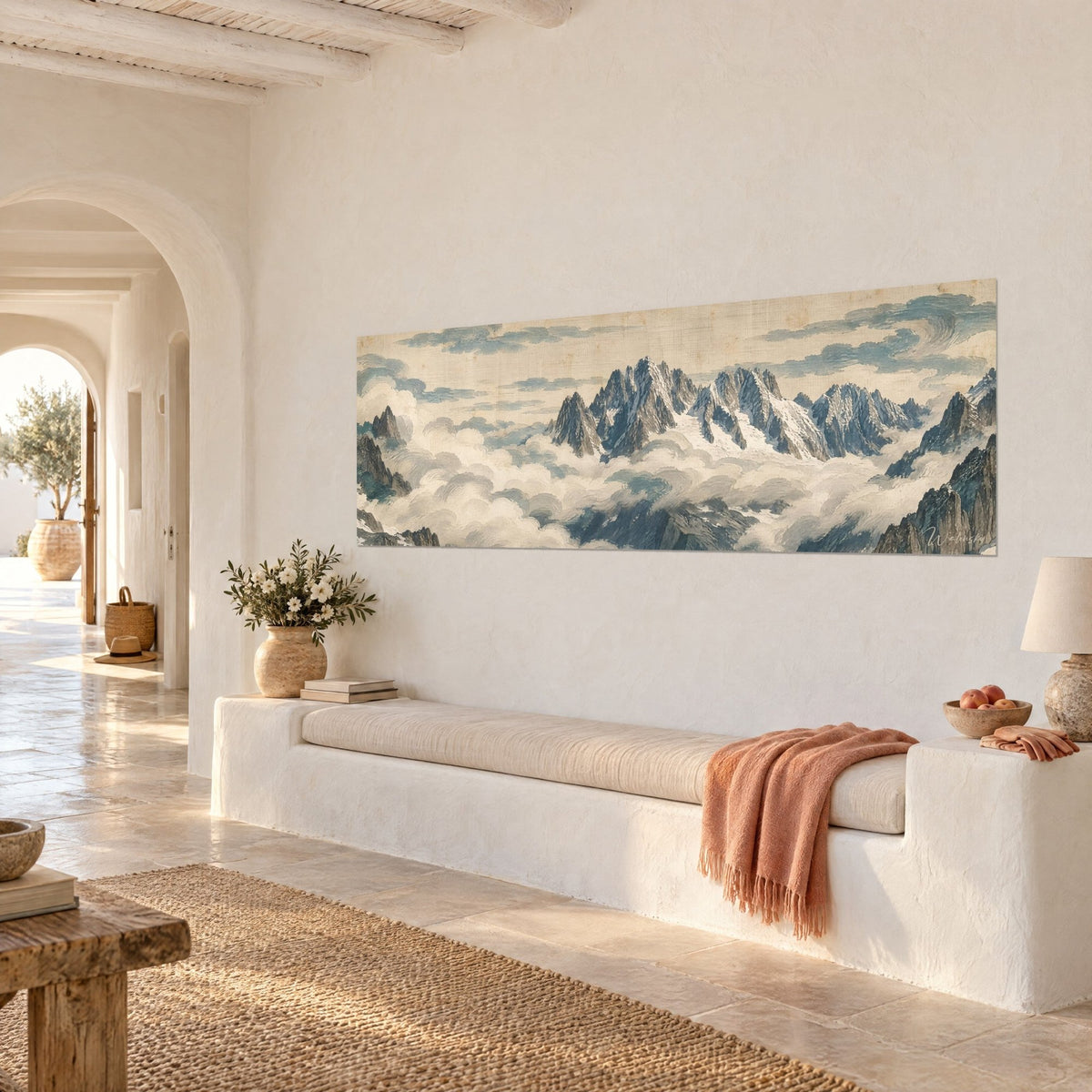 Wall art massive Mont Blanc in grey rocky spires and ivory clouds, hung on a whitewashed wall beside a stone bench