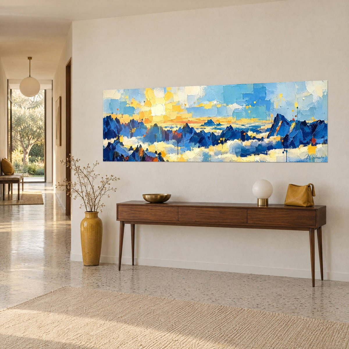 Wall art golden sea of clouds between ultramarine blue peaks, orange mosaic touches, on a wooden console, bright hallway