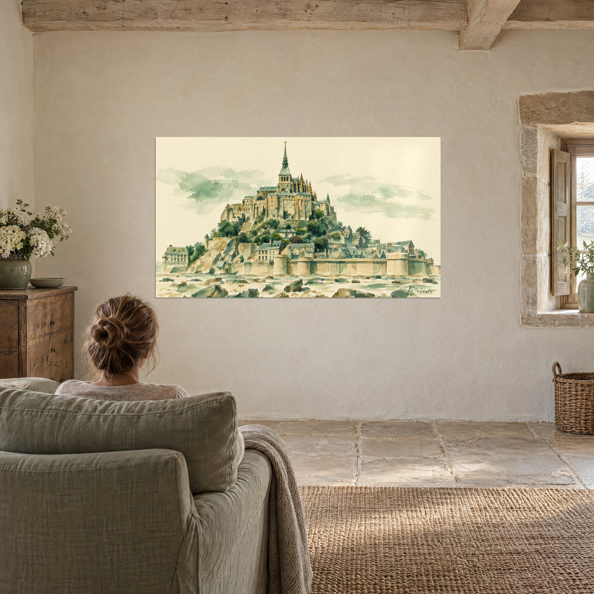 Wall art medieval abbey with grey-green slate roofs and ochre walls, facing a sage armchair by the window