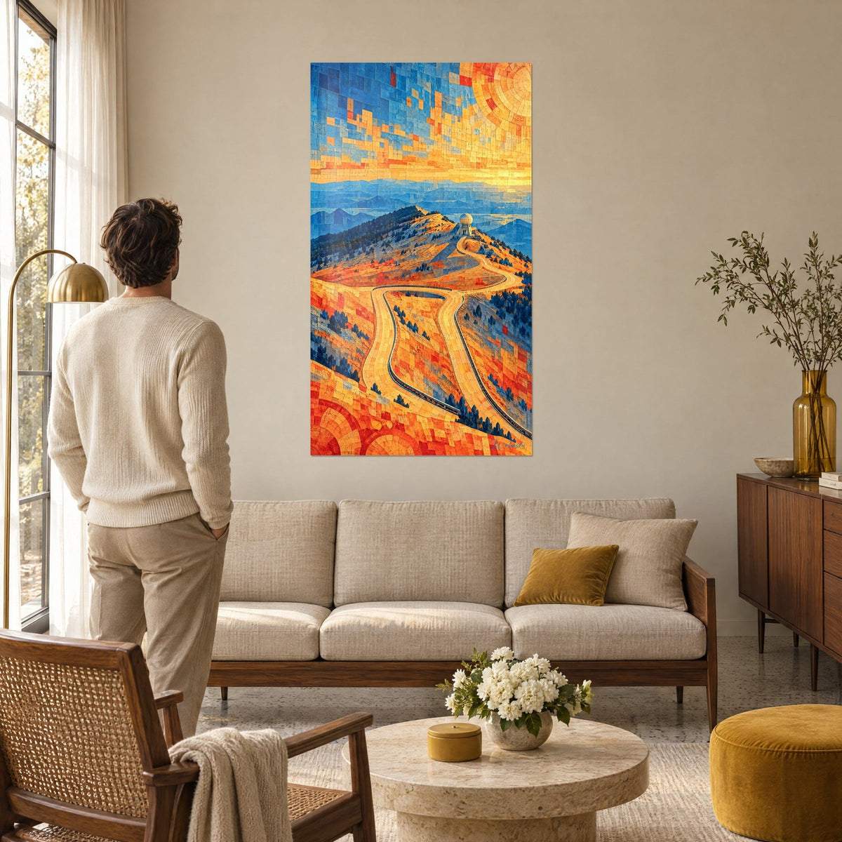 Wall art winding road in orange and blue mosaic climbing toward the observatory dome, above a sofa in a bright living room