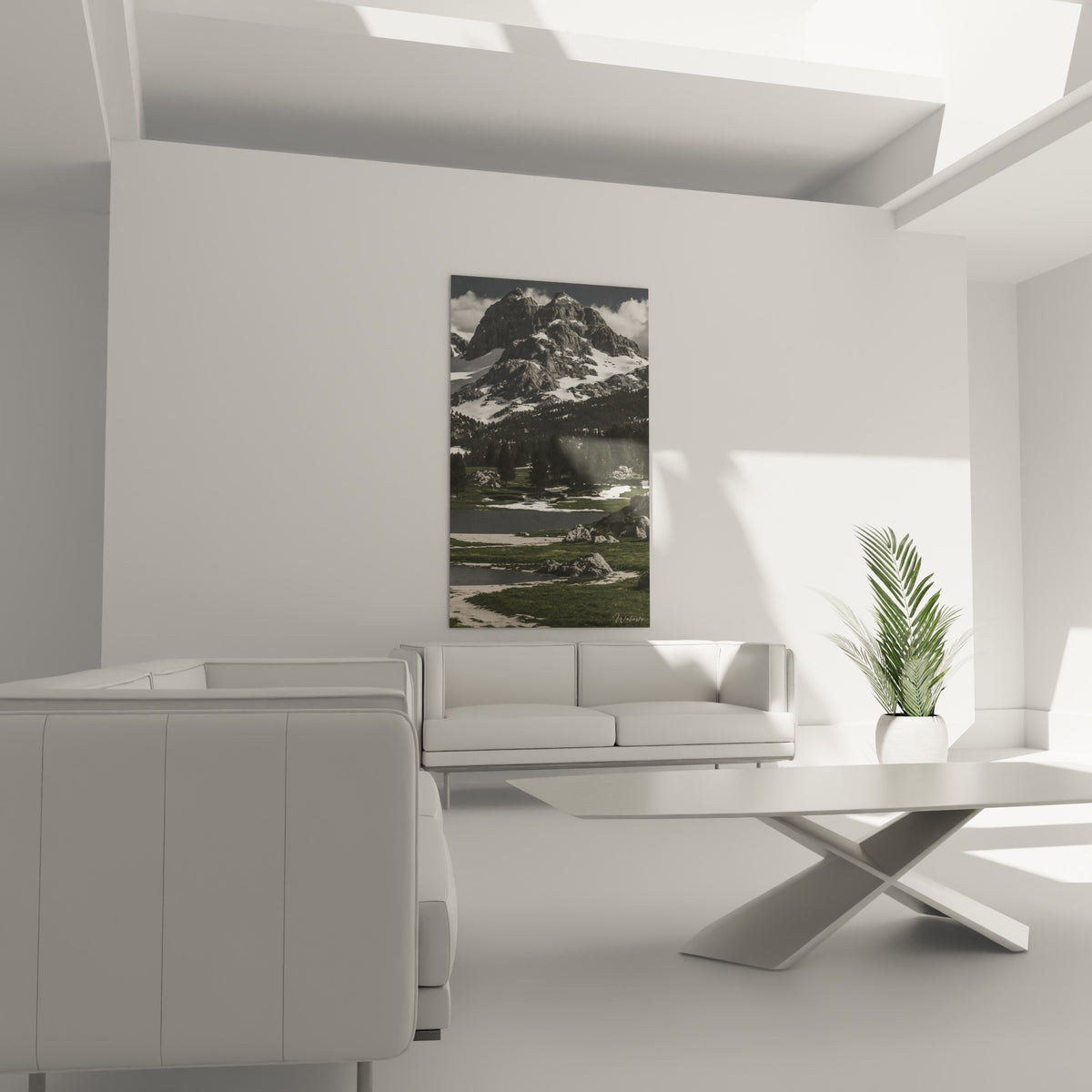 Montagne anthracite et vallée vert sauge, au-dessus d'un canapé dans un salon lumineux.