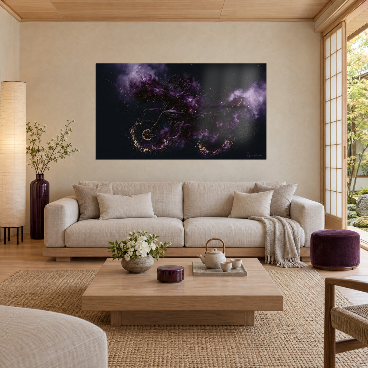 Wall art motorbike rider in violet nebula and golden dust, wheel ringed by copper sparks, above a sofa in a bright living room