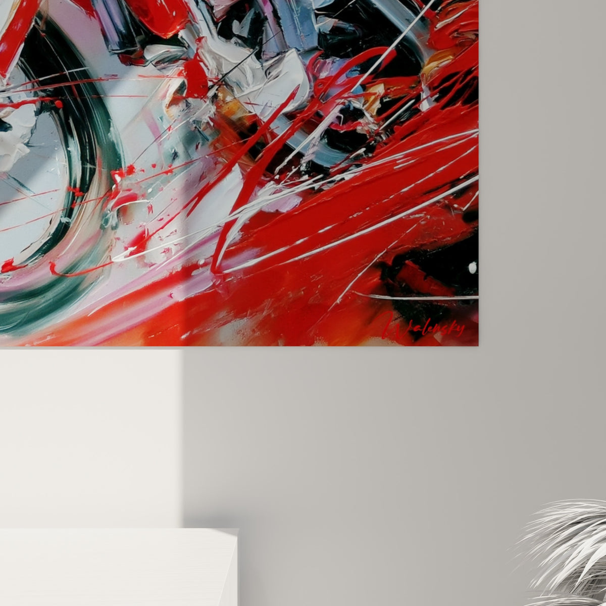 Empâtements de peinture rouge et blanche sur la roue avant, matière épaisse et coulures visibles de près