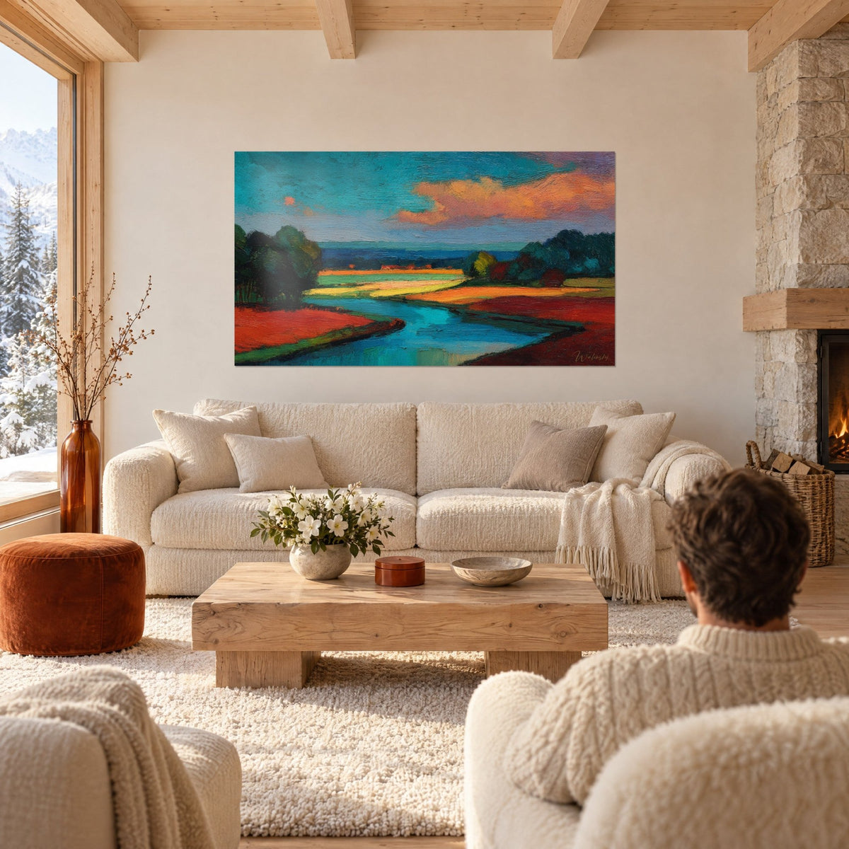 Wall art turquoise river winding between brick-red fields, orange sky with thick brushstrokes, above a sofa in a bright living room