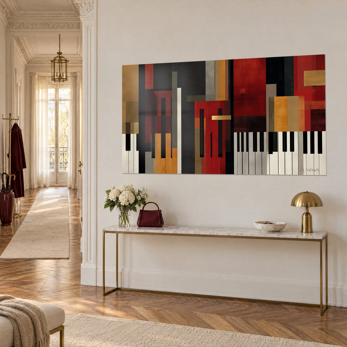 Tableau blocs superposés en bordeaux et noir charbon, clavier ivoire en bas, bande dorée, sur un mur crème au-dessus d'une console