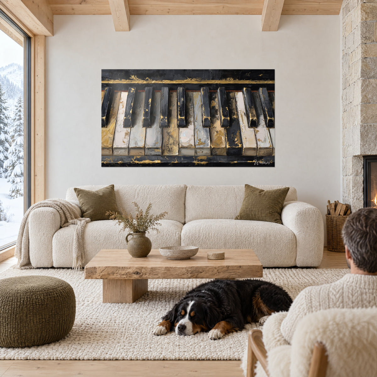 Tableau clavier de piano peint, touches noires et dorées éclaboussées, au-dessus d'un canapé dans un salon lumineux